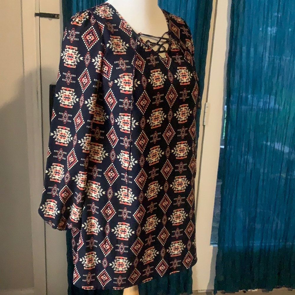 Black tribal print dress with a criss cross detail